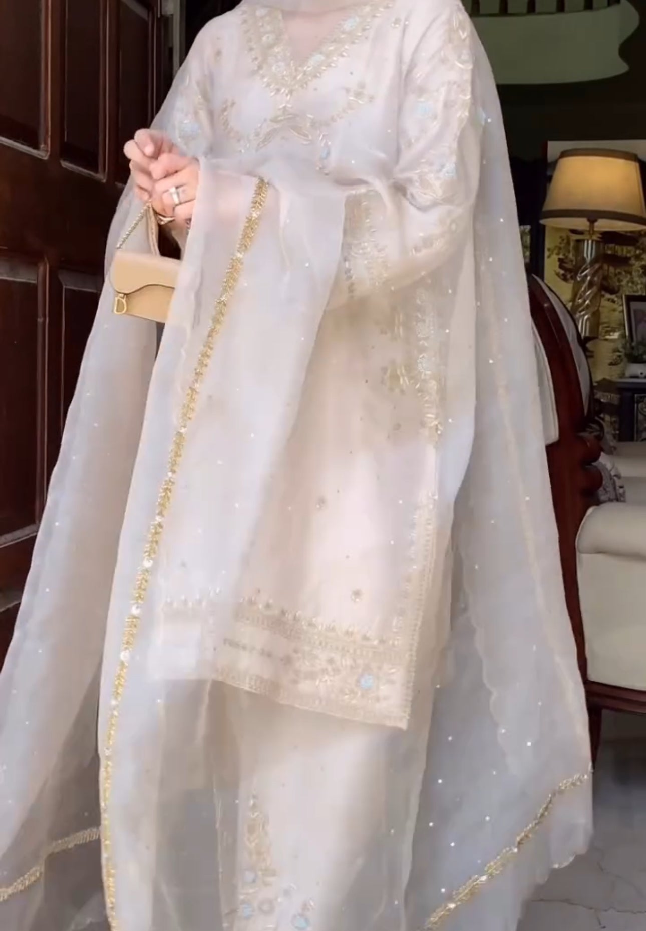 Gold thread embroidery with floral and ornamental motifs