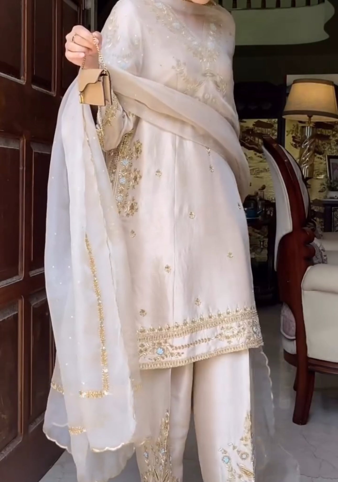 Gold thread embroidery with floral and ornamental motifs