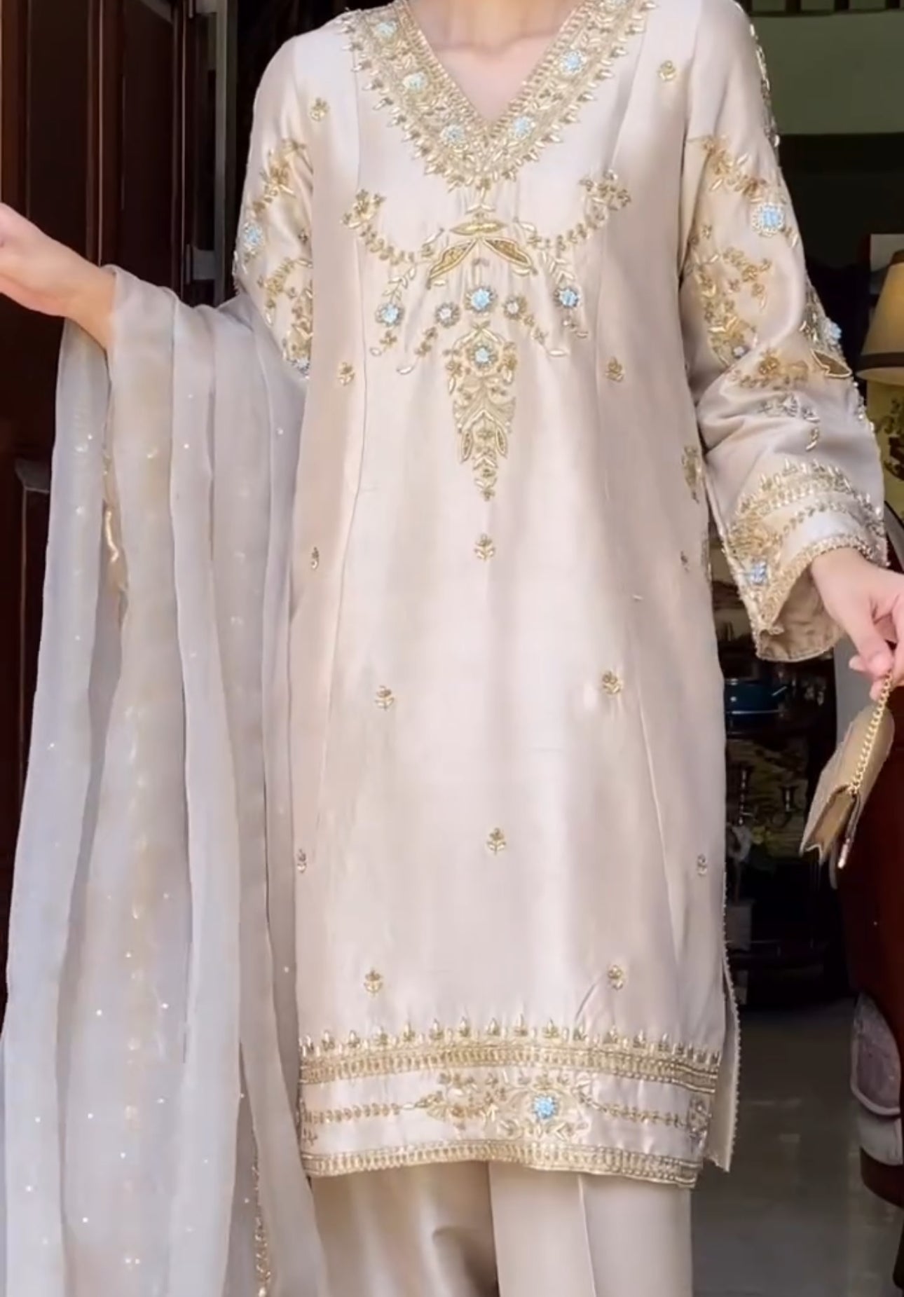 Gold thread embroidery with floral and ornamental motifs