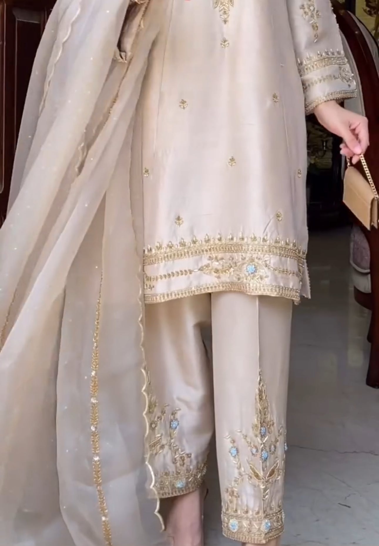 Gold thread embroidery with floral and ornamental motifs