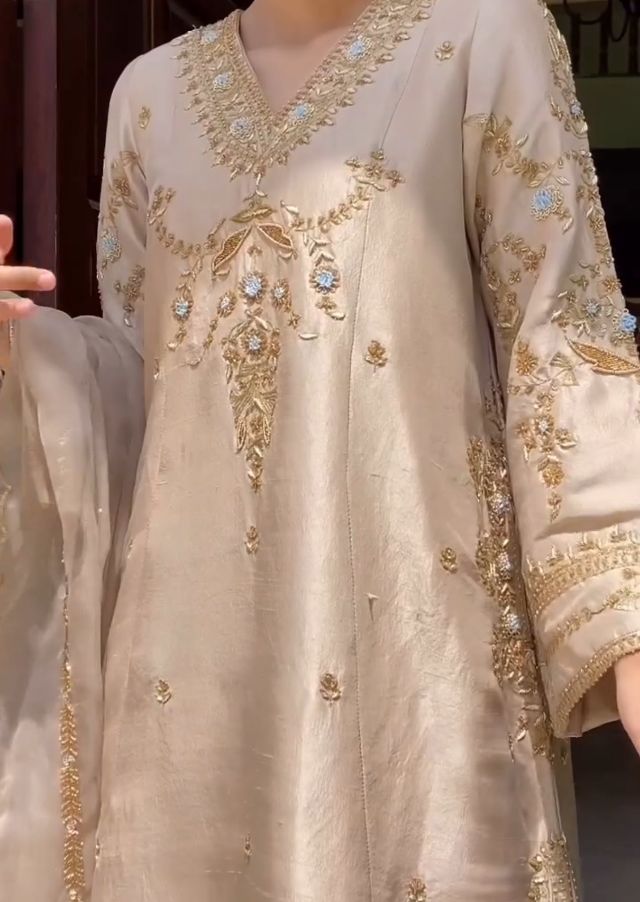 Gold thread embroidery with floral and ornamental motifs