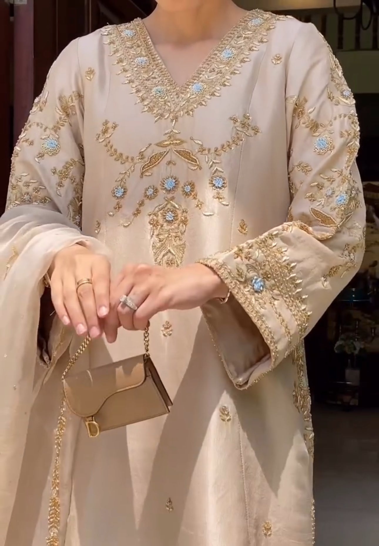 Gold thread embroidery with floral and ornamental motifs