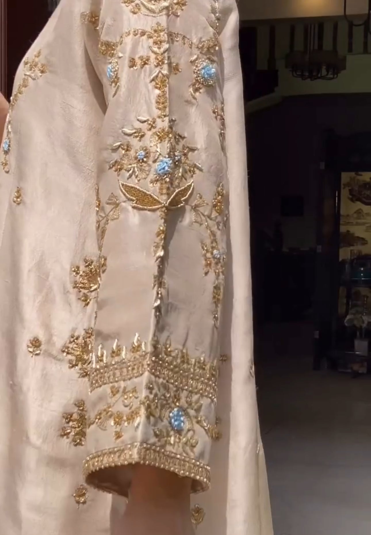 Gold thread embroidery with floral and ornamental motifs